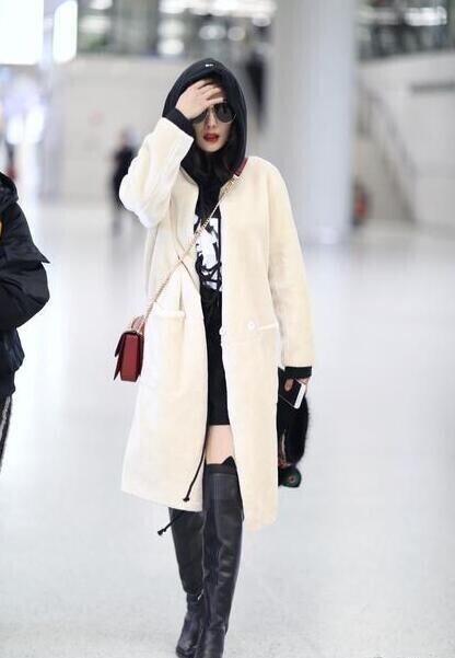 幂辣妈有点酷长款卫衣配高筒靴? 幂辣妈有点酷长款卫衣配高筒靴?