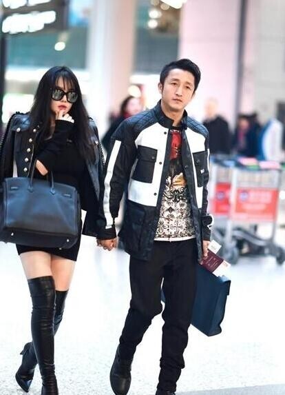 邹市明、冉莹颖夫妇潮装现身机场? 邹市明、冉莹颖夫妇潮装现身机场?